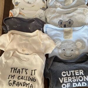 Bundle of infant t-shirt onesie’s
